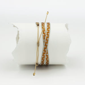 
                  
                    AZUA Triple Bracelet with Orange & White Shades
                  
                